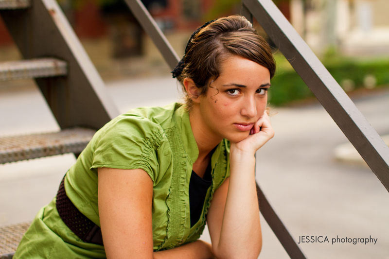 Senior Portrait of Janelle Yoder on Urban Fire Escape