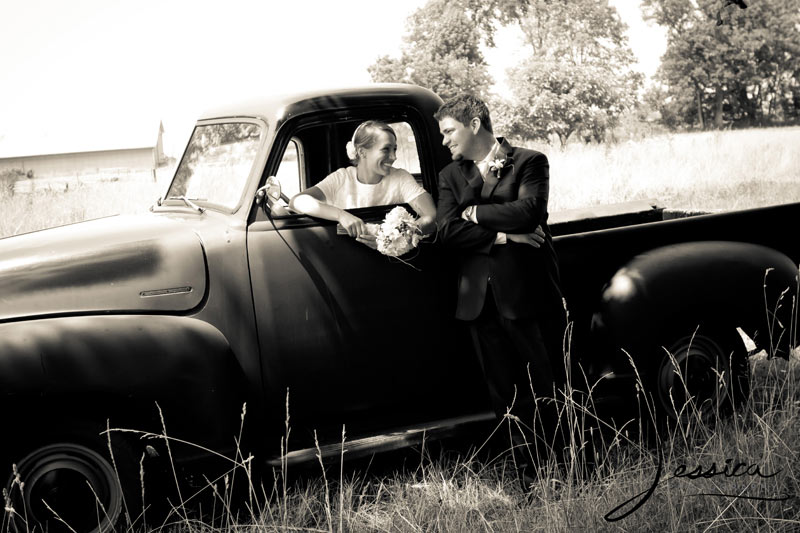 Wedding Pic of Allison & Zachary Gingerich with old truck