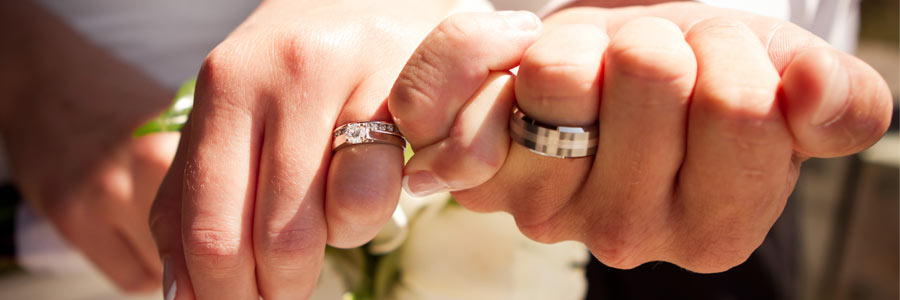 Wedding Pic of Jeremy Miller & Jennifer Watson Miller Ring on Fingers