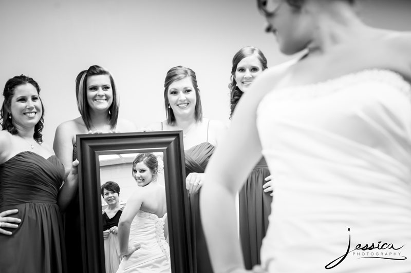 Picture of bride looking in mirror