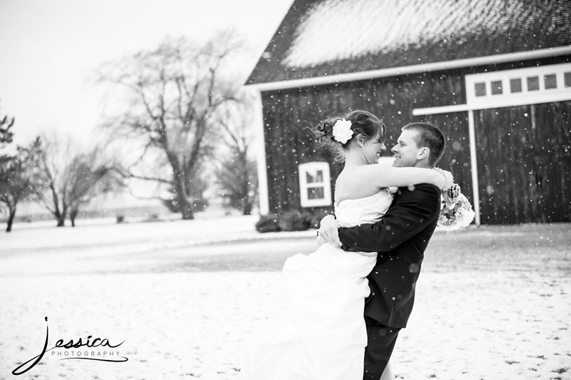 Mychal and Brooke Hill in snowy barn picture