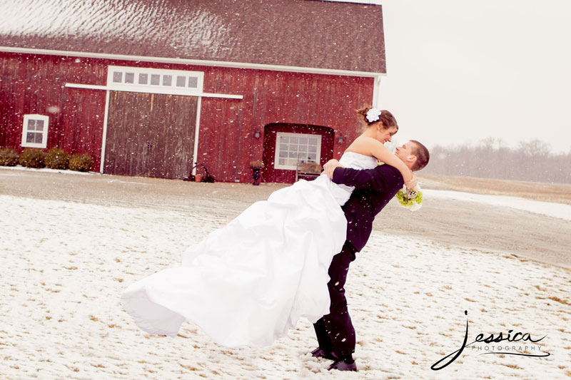 Mychal and Brooke Hill in snowy barn picture