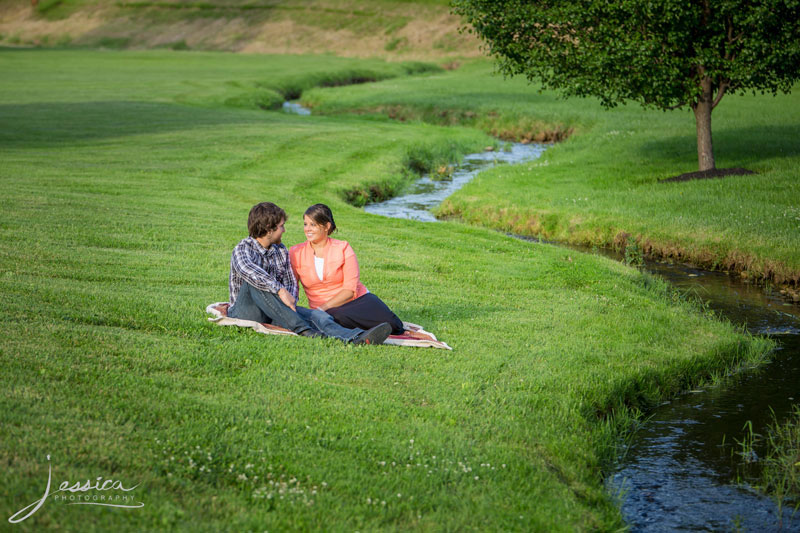 Engagement picture by a stream