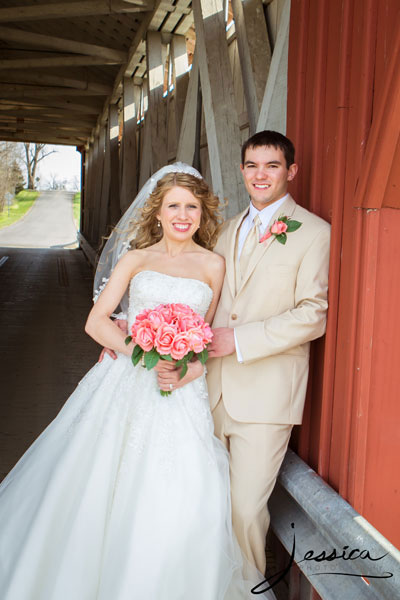 Wedding portrait of Jeffrey Wildermuth and Sarah Bell Wildermuth at a covered bridge